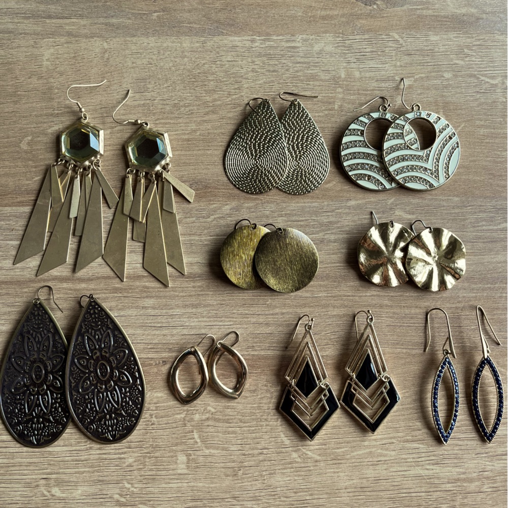 Gold earrings.
